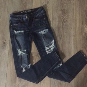 dark wash ripped american eagle jeans